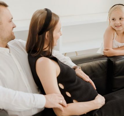 A loving family shares a tender moment, embracing joy and connection.